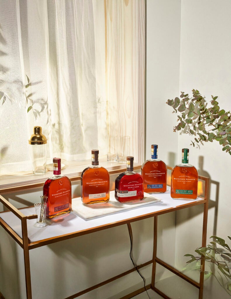Woodford Reserve's Wheat Whiskey, Bourbon Whiskey, Double Oaked Whiskey, Malt Whiskey, and Rye Whiskey featured together